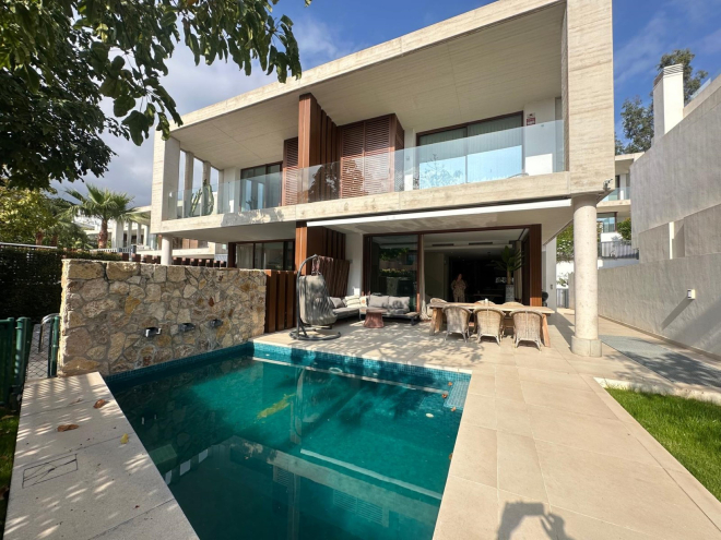 Exquisite recently built townhouse with private pool in The Collection on Marbellas Golden Mile